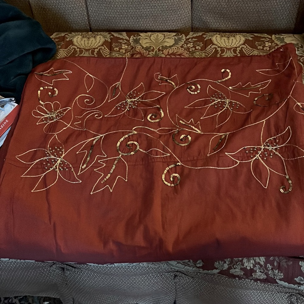 EMBROIDERED. RED THROW
